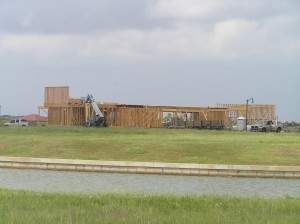 House view from across the lake on left side