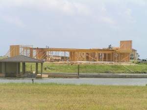 House view from across the lake on right side