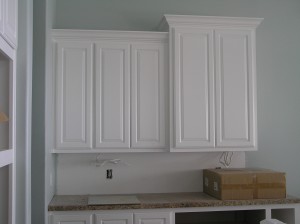 Doors on cabinet  next to range