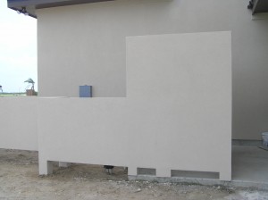 Stucco Wall around Outdoor Cabana Bath and Pool Equipment