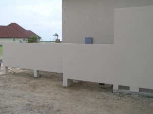 Stucco Wall around Outdoor Cabana Bath and Pool Equipment