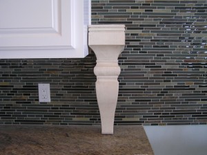 Range vent hood cabinet corbel painted with glaze finish