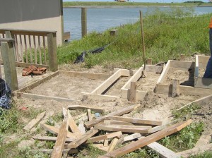 Sidewalk construction near boat dock stairs