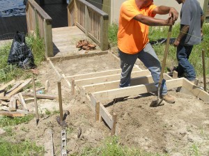 Sidewalk construction near boat dock stairs