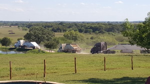 32 Bottom Loaders hauling in Road Fill