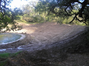 Big  hole in dam filled in with dozer